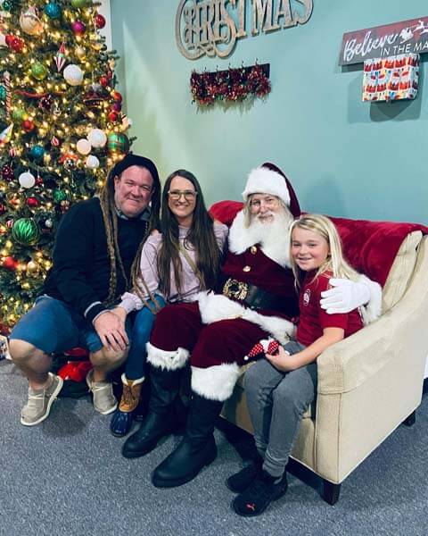 Family sitting with Santa