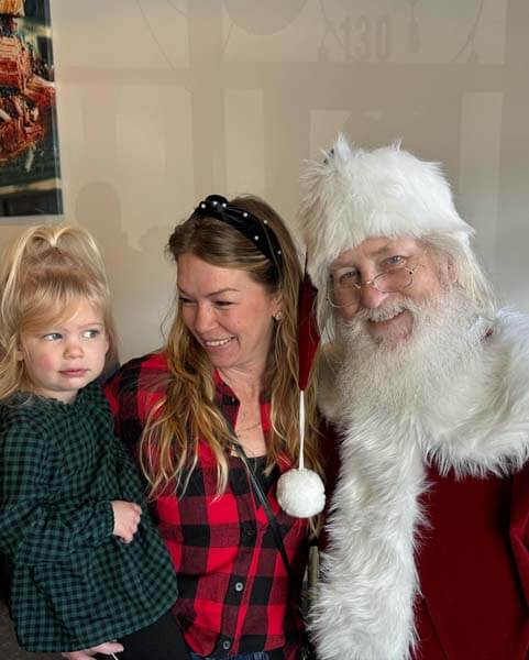 Santa with mother and daughter